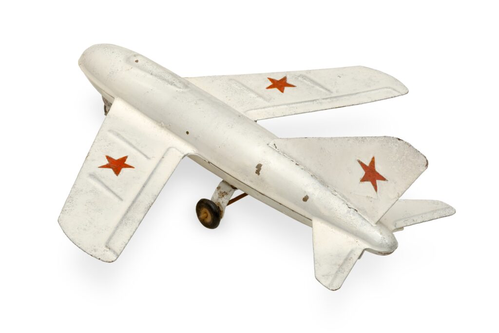 Old tin toy airplane